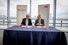 MIT and Liberty Mutual Insurance announced a $25 million, five-year collaboration to support intelligence research at a meeting on Tuesday attended by Liberty Mutual Chairman and CEO David Long (left) and MIT President L. Rafael Reif.  Photo: Rose Lincoln